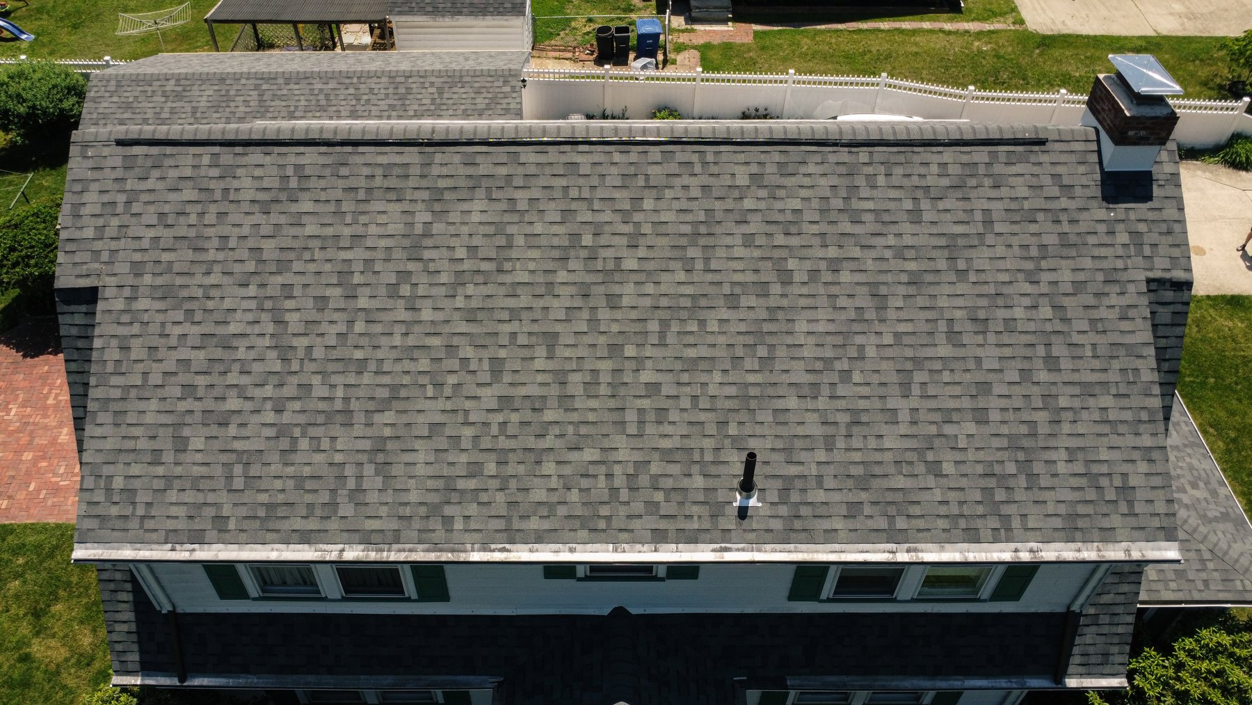 Close aerial view of Estate Gray architectural shingles and new ridge vent in Pitman NJ
